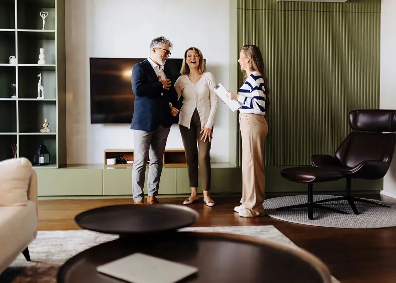 People talking in a modern living room.